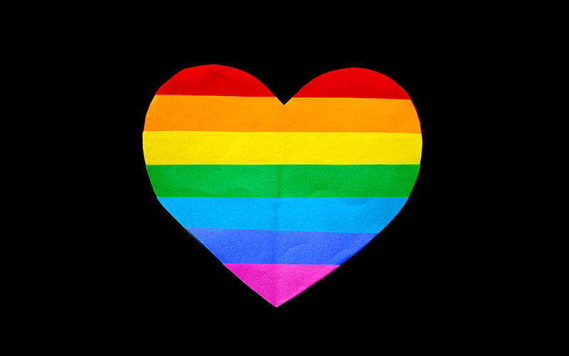 Pride Month, rainbow heart on black background