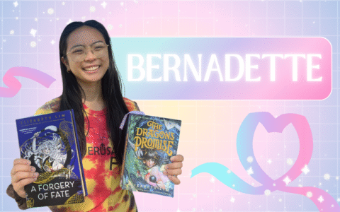 A woman stands with two books in front of a pastel rainbow background