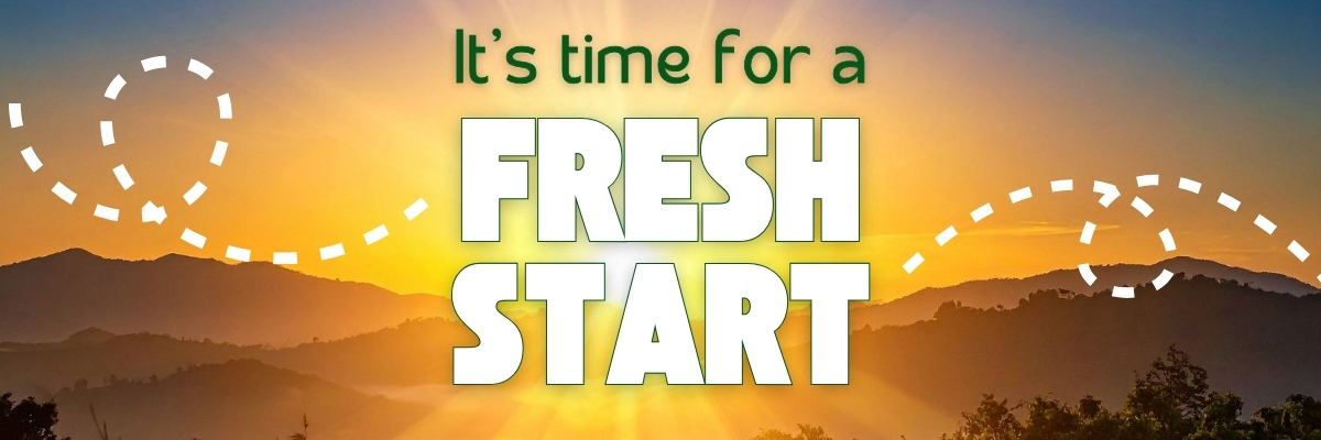 A sunrise over landscape has the words "It's time for a fresh start"