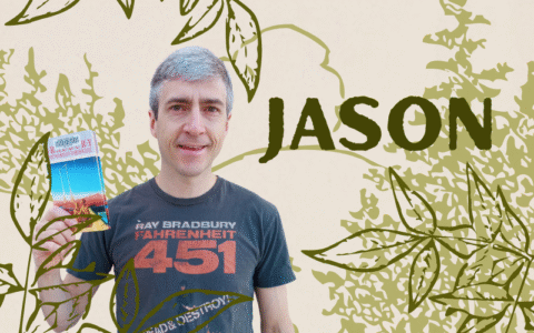 A photo of a man with gray hair holding a book. The background has drawings of greenery.